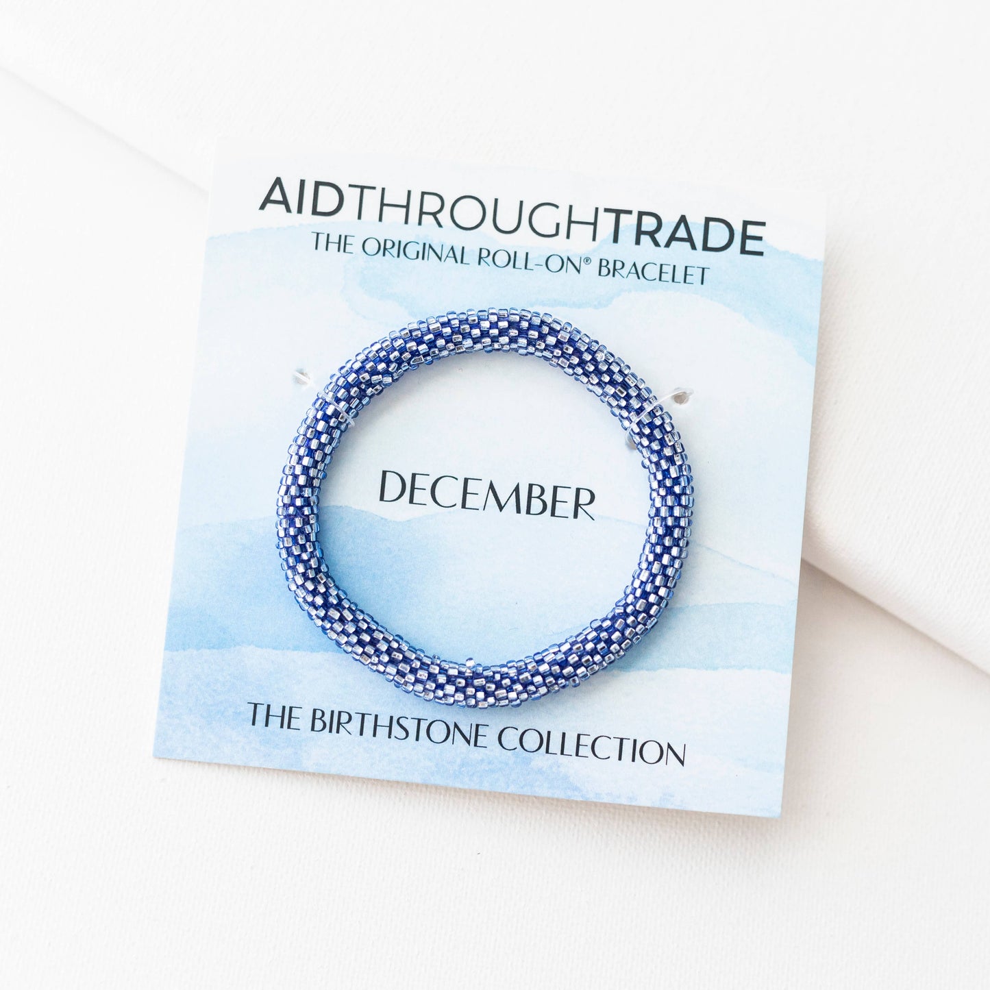 Roll-On® Bracelet - December Birthstone